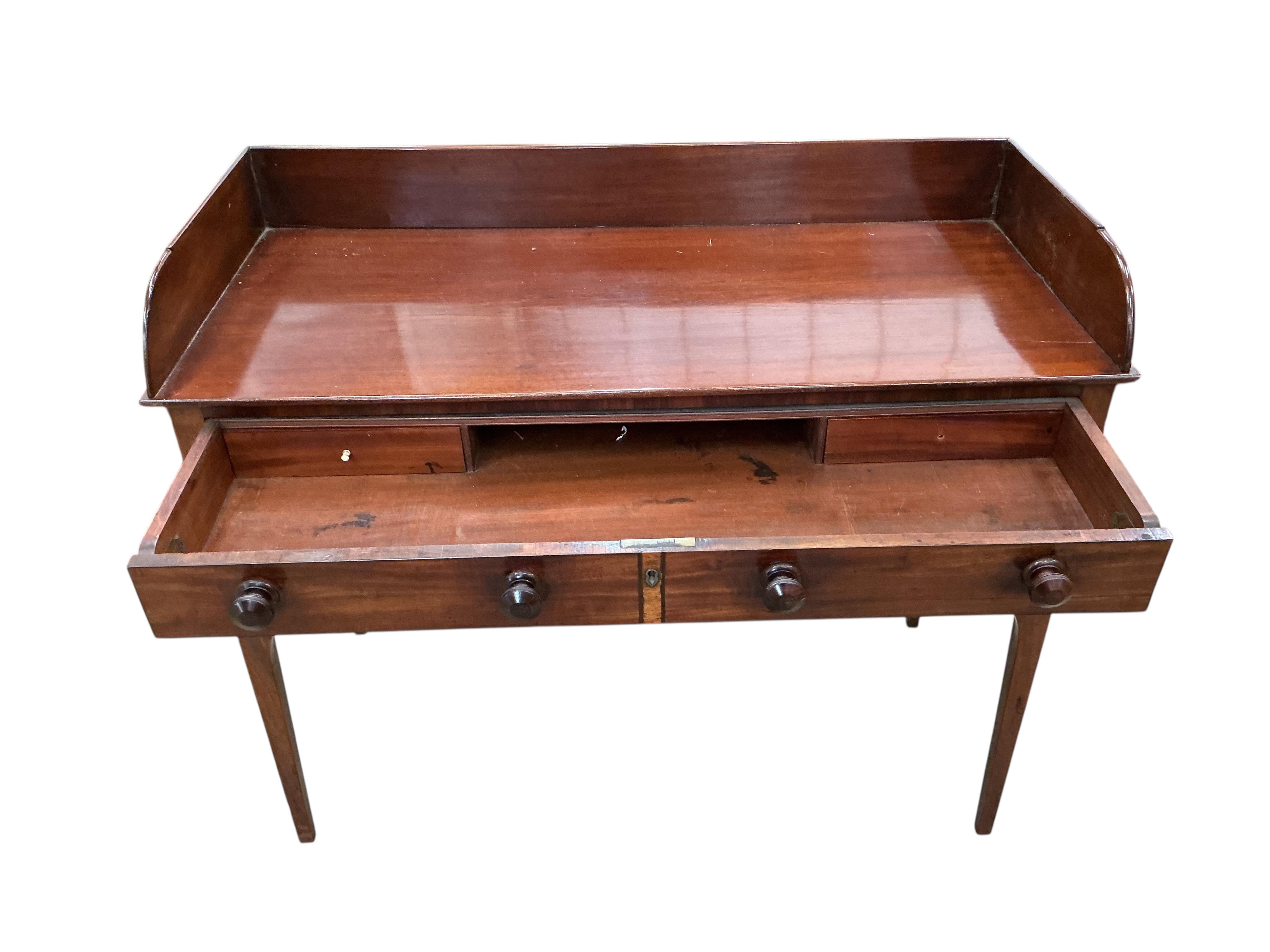 A George III mahogany washstand, width 106cm, depth 48cm, height 88cm